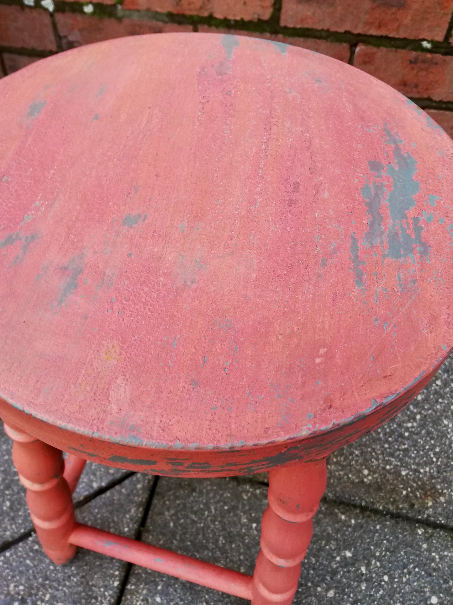 Vintage wooden stool painted in layers of chippy milk paint