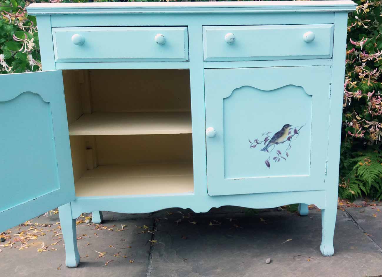 hand painted sideboard with bird design