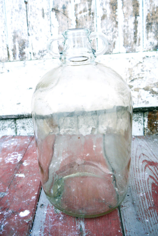 Beautiful large glass vintage bottles with handles