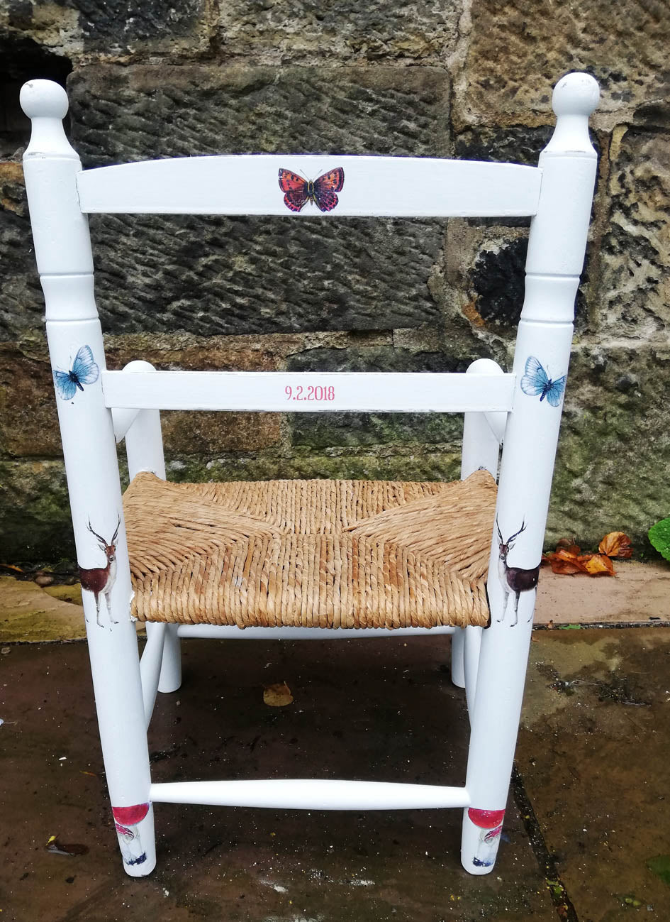 painted children's rush seat chair with vintage woodland theme