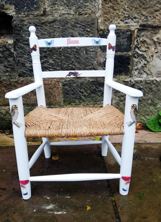 painted children's rush seat chair with vintage woodland theme