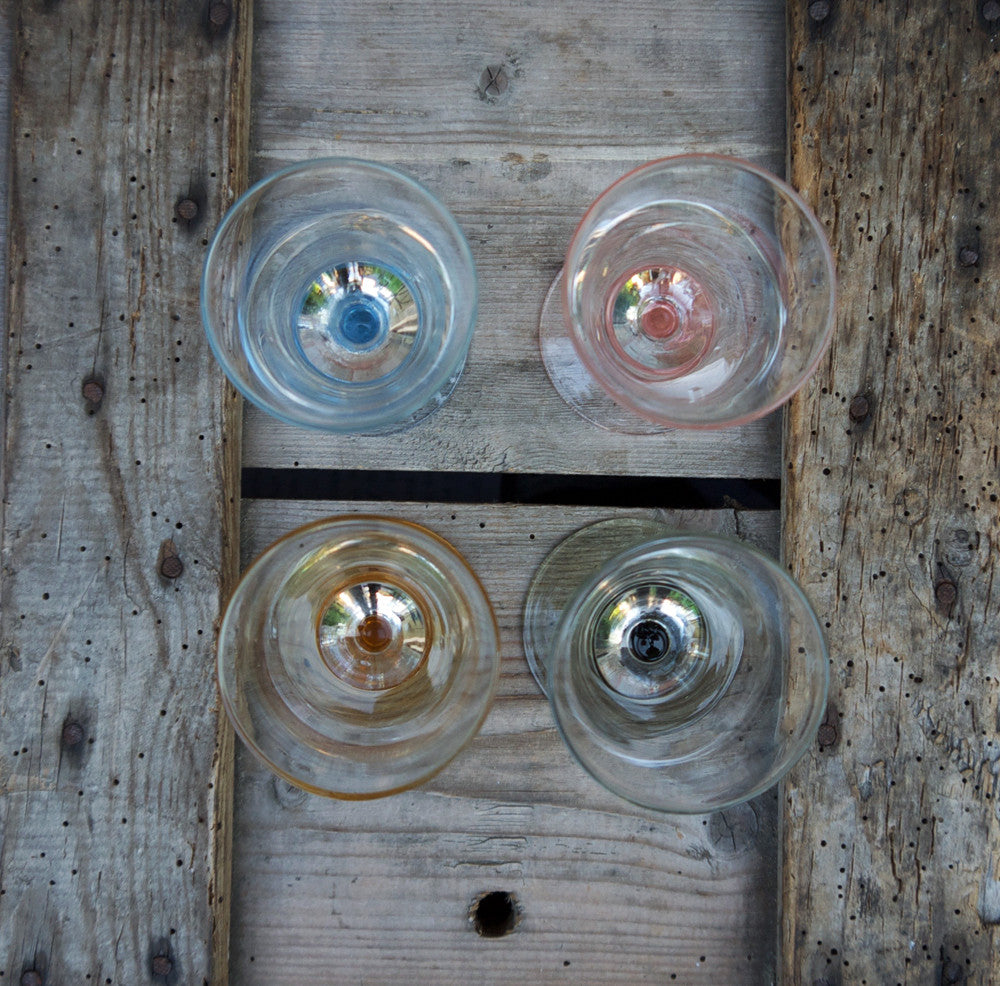 beautiful set of 4 glasses with coloured stems. Perfect condition.