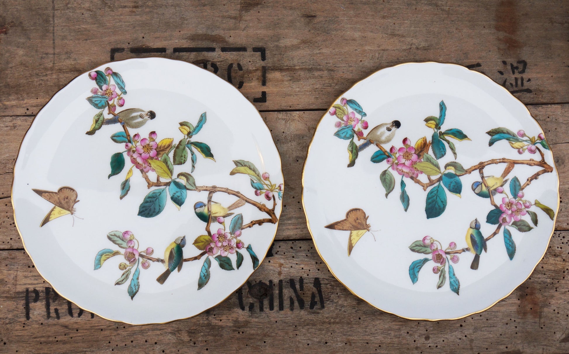 Beautiful and unusual vintage birds and blossom dinner / cake plates .stunning colours and great condition.