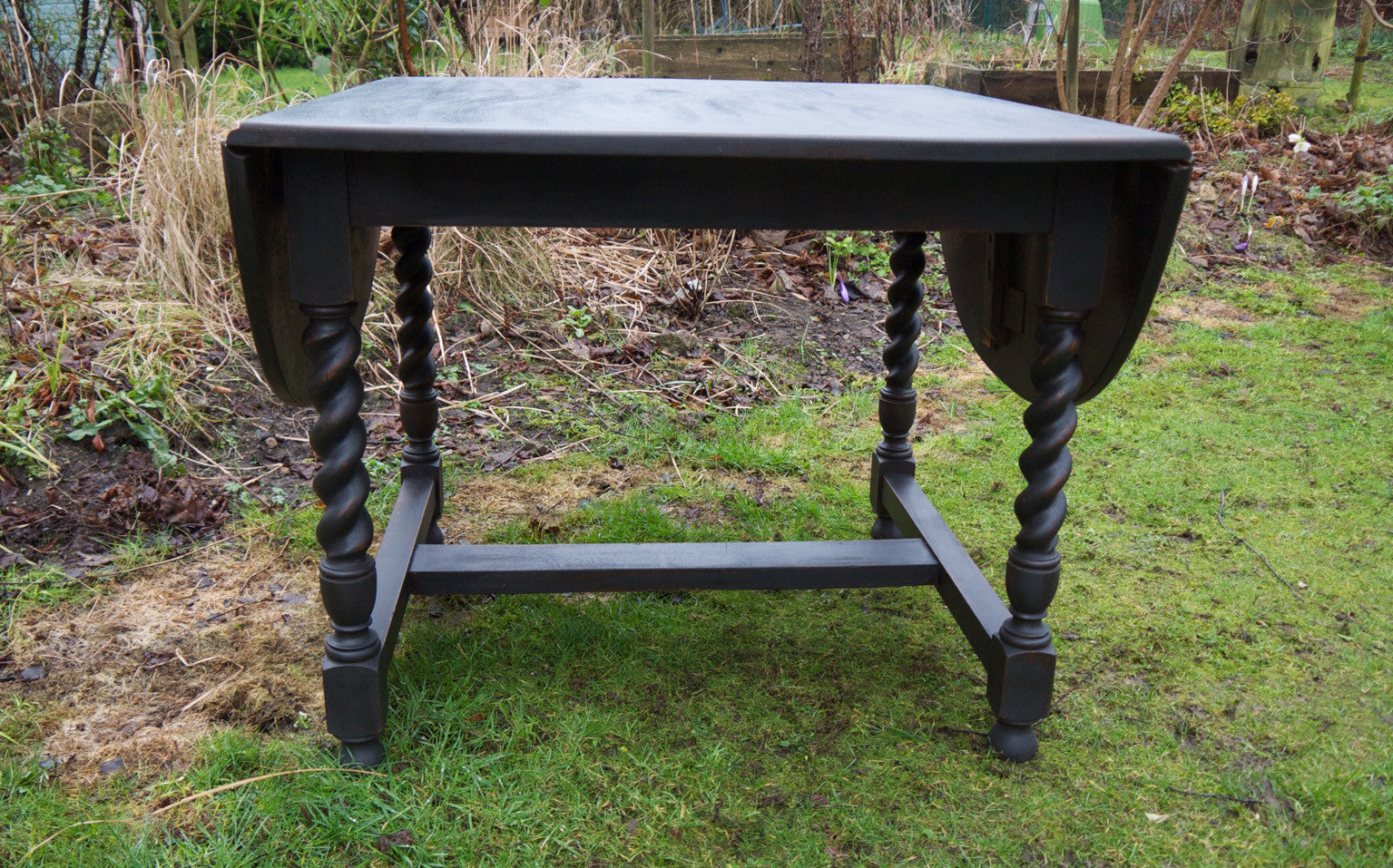 Oval dropleaf barley twist dining table painted in Miss Mustard