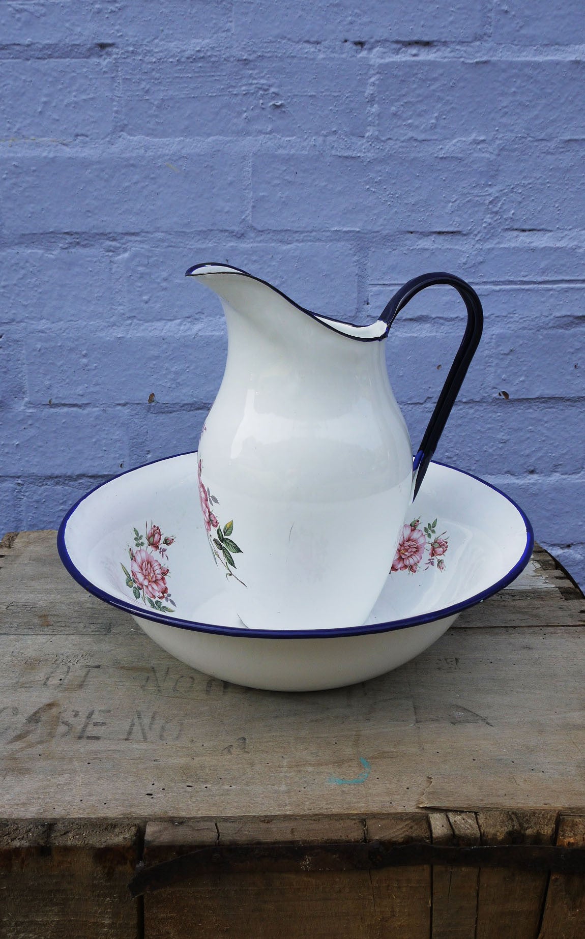 vintage enamel basin and pitcher in  Blue and White with a pretty floral design