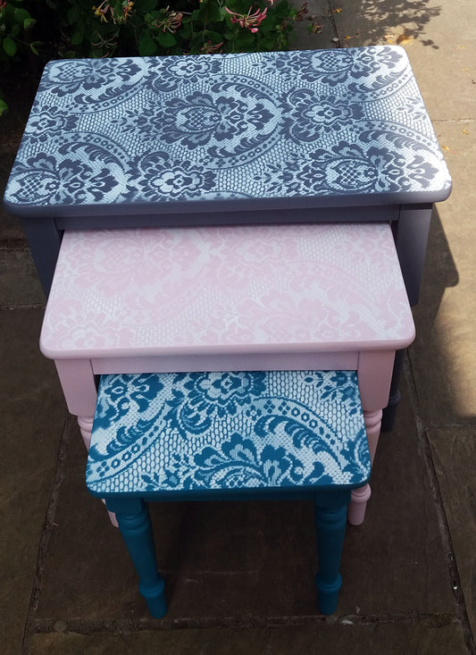 Vintage nest of tables with lace design