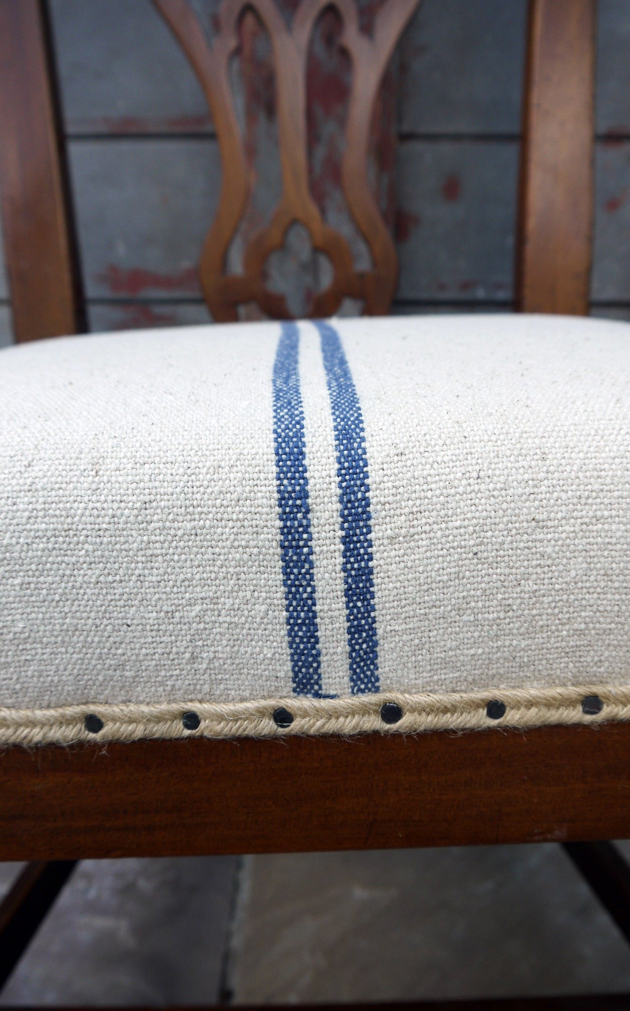 Vintage occasional bedroom chair in grain sack linen upholstery.