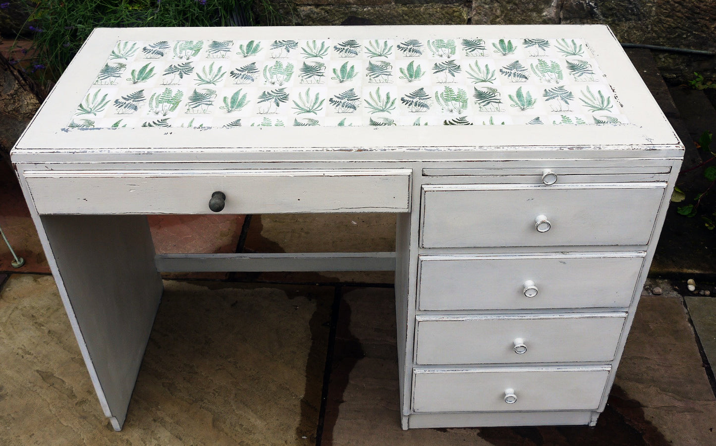 Vintage writing desk painted in chippy miss mustard seed milk paint grain sack grey layered with Bergere and a botanical fern design